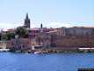 Alghero: i bastioni e le torri spagnole: i bastioni visti dal mare con la Torre di Sant&rsquo;Erasmo