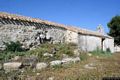 Escolca: chiesa campestre di San Simone con i resti di un nuraghe