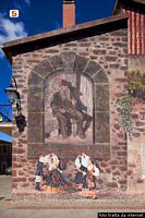Abbasanta-Murale di Pina Monne in piazza della Vittoria: figure maschili e femminili