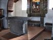 Aidomaggiore: chiesa dedicata a San Gavino Martire: altare con i sedili realizzati con vecchie lastre di basalto