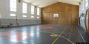 Arbus: impianti sportivi della Scuola media: ingresso ed esterno della palestra