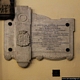 Aritzo-chiesa parrocchiale di San Michele Arcangelo: lapide che ricorda il commendator Antonio Arangino e la moglie donna Marianna Vargiu