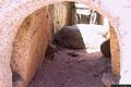 Arzachena-tomba di giganti di Coddu Vecchiu: veduta interna dal portello alla base della stele
