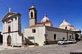 Baunei: chiesa parrocchiale di San Nicola di Bari: retro con il portale che costituisce la finta facciata Baunei: chiesa parrocchiale di San Nicola di Bari: retro con il portale che costituisce la finta facciata