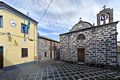 Boroneddu-La chiesa parrocchiale di San Lorenzo Martire nella piazza con il Municipio