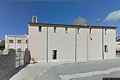 Buddusò: chiesa di San Quirico: ingresso lungo la fiancata