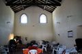 Cagliari: chiesa medioevale di Sant’Alenixedda: interno durante prove di suoni all’organetto