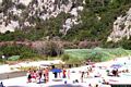 Dorgali-Cala Luna: veduta della spiaggia di Cala Luna con il ponticello sullo <em>stagno retrodunale</em> ed il bosco di oleandri rosa