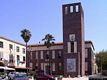 Alghero-Fertilia: la torre littoria davanti alla sede del Municipio Alghero-Fertilia: la torre littoria davanti alla sede del Municipio