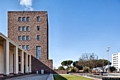 Carbonia-Veduta dell’ex Dopolavoro Centrale verso la Torre Civica