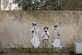Carbonia-Serbariu: il murale 'Strilloni. Venditori di giornali, bambini con giornali' di Debora Diana in via Fabio Filzi 23
