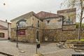 Cargeghe-La piazzatta con il murale 'Architetture con attrezzi agricoli e figure femminili'
