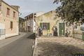 Cargeghe-Veduta del murale 'Architetture con figure maschili e femminili'