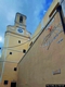 Carloforte-chiesa parrocchiale di San Carlo Borromeo: campanile visto dal fianco destro contiguo al tessuto urbano Carloforte-chiesa parrocchiale di San Carlo Borromeo: campanile visto dal fianco destro contiguo al tessuto urbano