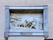 Cuglieri-Basilica di Santa Maria della Neve: scultura in rilevo sulla facciata alla destra del portale