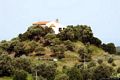 Cuglieri: chiesa campestre di Sant’Imbenia: veduta della chiesa sulla sommità di uno spuntone vulcanico