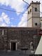 Galtellì: chiesa del Santissimo Crocefisso: ingresso laterale e torre campanaria