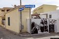 Girasole-Il murale che rappresenta una composizione con figure
