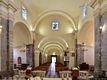 Gonnosfanadiga: chiesa parrocchiale di Santa Barbara: la navata verso il portale di ingresso