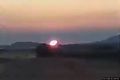 Isili-Sorgere del sole dietro il nuraghe Longu