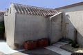 Monastir: chiesa di San Giacomo Maggiore: la colonna militare romana appoggiata al lato sinistro della chiesa