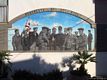 Montresta-Un murale sulle case del paese