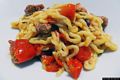 Morgongiori-Sagra delle lorighittas e Mostra del tappeto e dellarazzo: un piatto di lorighittas con pomodori e salsiccia