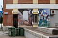 Onanì: la piazza del comune con i suoi murales