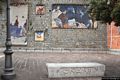 Onanì: la piazza del comune con i suoi murales