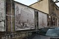 Orani-manifesti che illustrano la realizzazione della facciata della chiesa da parte di Costantino Nivola
