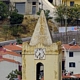Orgosolo-Chiesa parocchiale di San Paolo Apostolo: l'orologio che guarda a sud con un quadrante a numeri arabi fermo sulle 7 e 27 Orgosolo-Chiesa parocchiale di San Paolo Apostolo: l'orologio che guarda a sud con un quadrante a numeri arabi fermo sulle 7 e 27