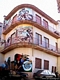 Orgosolo-Tre Murales sulla facciata del palazzo della Biblioteca Comunale