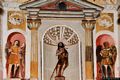 Oristano: chiesa di San Giovanni dei Fiori: l’angelo nero alla sinistra di San Giovanni Battista