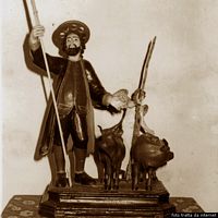 Orosei-Chiesa di Nostra Signora delle Grazie: gruppo scultureo che rappresenta San Isidoro Agricoltore che prega