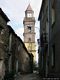 Ortueri-Via del centro con sullo sfonndo il campanile della chiesa parrocchiale di San Nicolò Vescovo