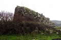 Osilo-Veduta dei resti del nuraghe semplice Baiolu