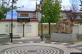 Perdasdefogu: la piazza Caduti sul lavoro con il monumento e la Biblioteca Comunale