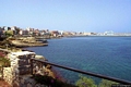 Porto Torres-Spiaggia delle Acque Dolci: veduta della città dalla strada che porta a Balai