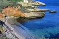 Porto Torres-Lo Scoglio Ricco nel mare davanti alla spiaggia