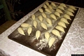 Porto Torres-Il ristorante Li Lioni: i culingiones di patate, notare la chiusura artistica a mano (quasi un ricamo)