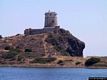 Pula-ora: la Torre del Coltellazzo con il faro della stazione semaforica di capo Pula