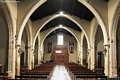 San Gavino Monreale-chiesa parrocchiale di Santa Chiara Vergine: la navata centrale verso l’ingresso