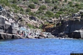 Carloforte-Persone sugli scogli di Punta di Capo Rosso Carloforte-Persone sugli scogli di Punta di Capo Rosso
