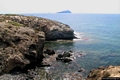 Sant’Antioco-Rocce e mare dall’alto di Capo Sperone con le isole all’orizzzonte