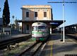 Sassari: la Stazione ferroviaria: treno a scartamento ridotto sul binario