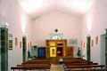 Senis: chiesa dei Santi Cosma e Damiano: interno verso il portale di ingresso