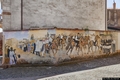 Silanus-Il murale che rappresenta una processione religiosa