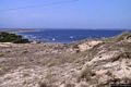 San Giovanni del Sinis-Mare Morto e sullo sfondo la città di Oristano