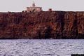 Capo San Marco: veduta dal mare del faro di capo San Marco Capo San Marco: veduta dal mare del faro di capo San Marco