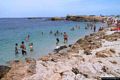 Is Arutas: scogliere ai lati della spiaggia